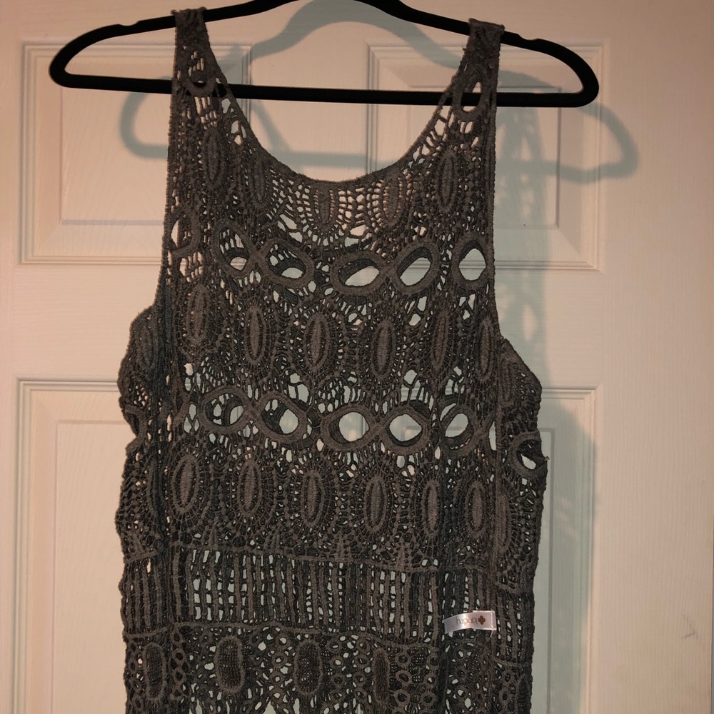 See-through top.